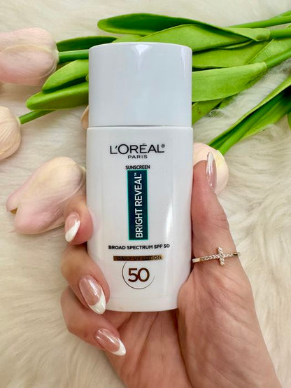 L'ORÉAL PARIS Bright Reveal Broad Spectrum SPF 50 Daily UV Lotion, 1.7 fl oz