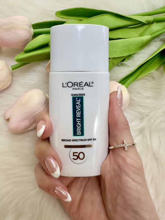 L'ORÉAL PARIS Bright Reveal Broad Spectrum SPF 50 Daily UV Lotion, 1.7 fl oz
