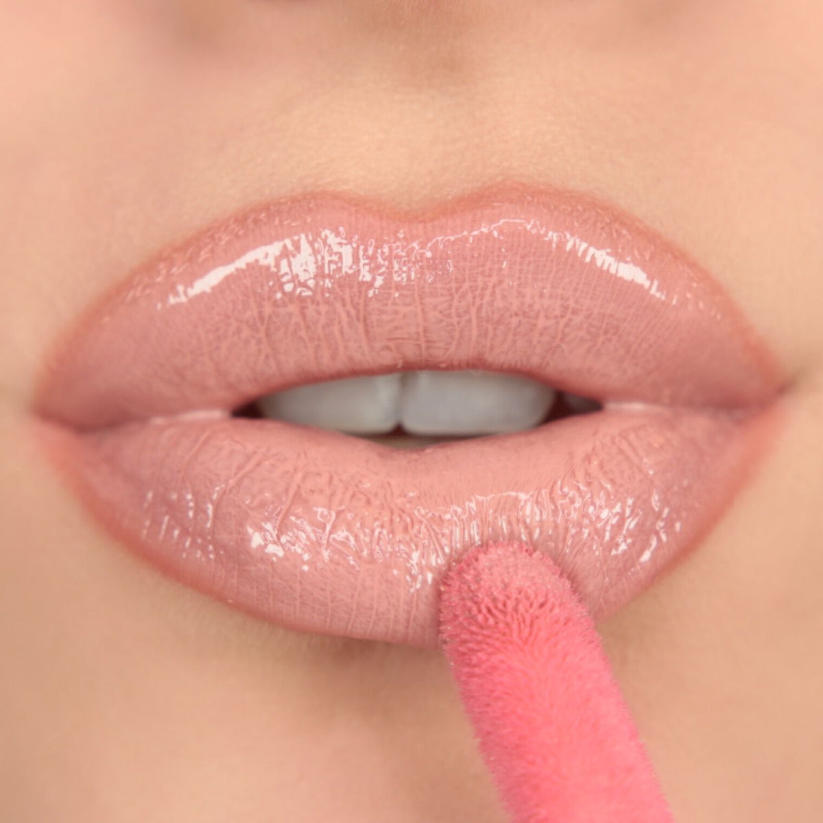 REVOLUTION Pout Bomb Plumping Gloss - Kiss Baby Pink